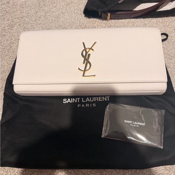 Saint Laurent Handbags - Saint Laurent White Classic Monogramme Clutch with Gold Logo